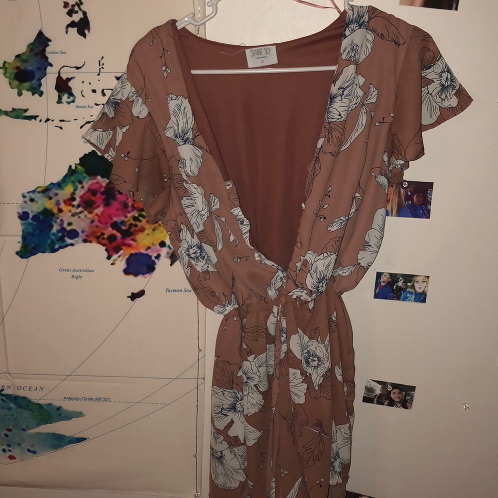 mauve romper with flowers